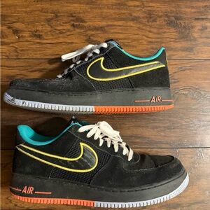Nike Air Force 1 Black Sneakers with Yellow and Orange Accents